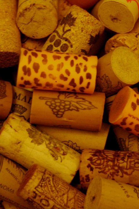 Wine cork collection representing the wine experience at Bistro Estrada