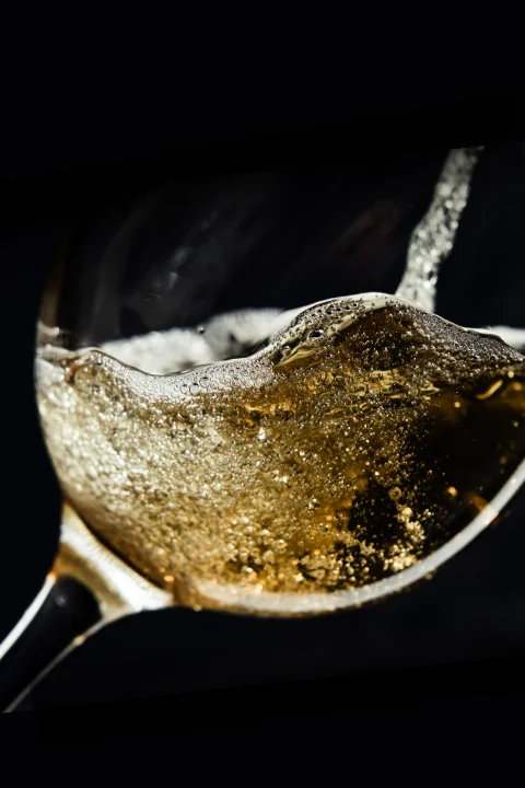 Wine being poured into a glass at Bistro Estrada in Granada, Nicaragua